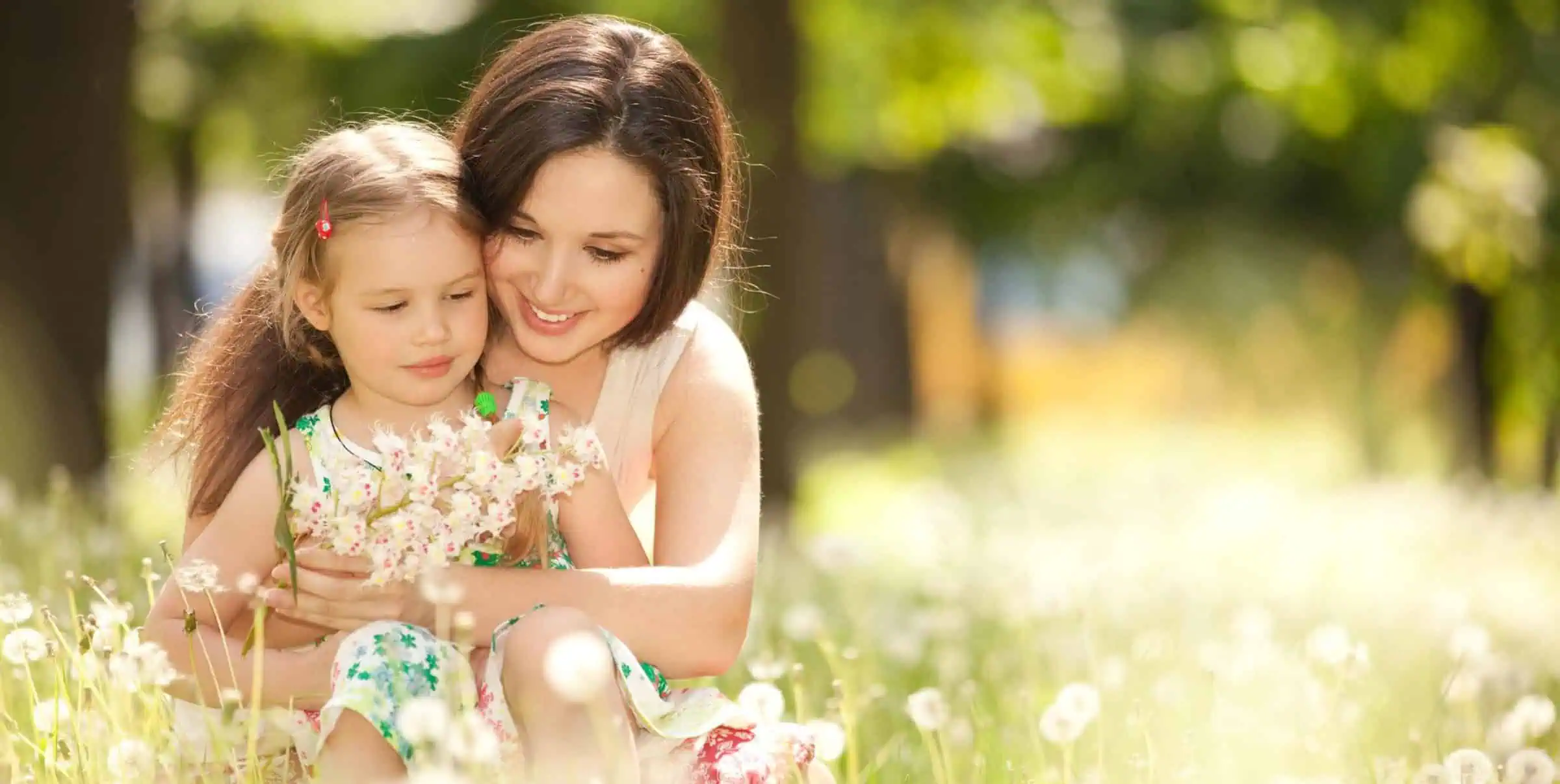 nanny and child in outdoor spring setting